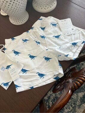 Sant and Abel Men's White Swim Shorts with Blue Bird Print